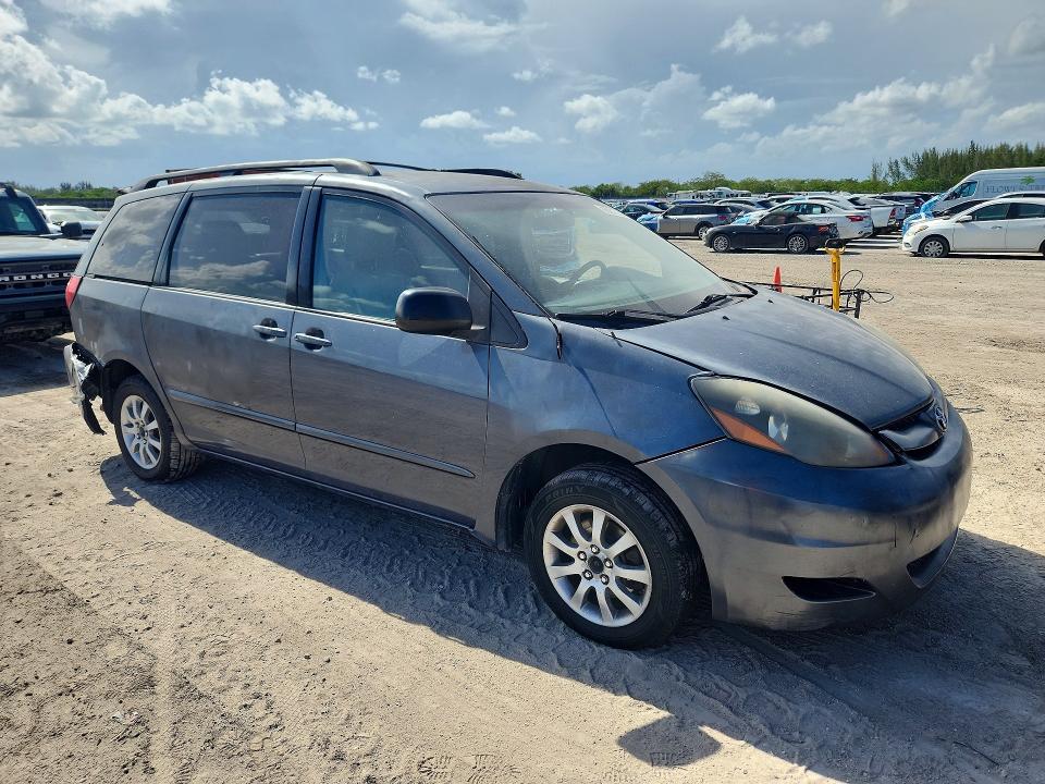 2010 Toyota Sienna VIN 5TDKK4CC6AS296284 COPART salvage auction — REAR END, Fl - Cert Of Title Slvg Rebuildable, sold $700 on 2026-07-15 (photo 4)