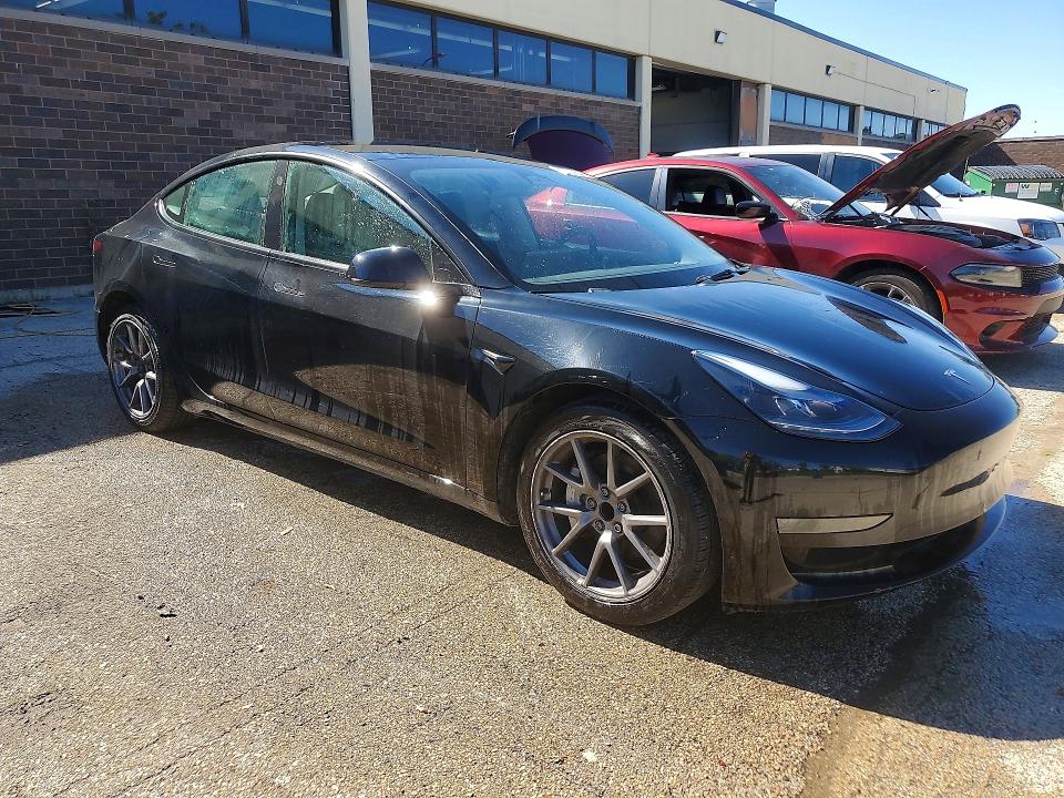 2023 Tesla Model 3 VIN 5YJ3E1EAXPF436193 COPART salvage auction — UNDERCARRIAGE, Il - Salvage Certificate, sold $6,100 on 2026-07-13 (photo 4)