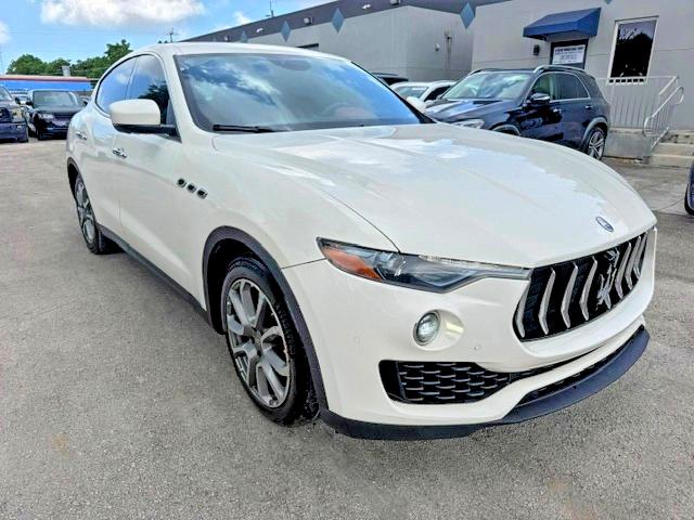 2018 Maserati Levante VIN ZN661XUA6JX292117 COPART salvage auction — MINOR DENT/SCRATCHES, Fl - Certificate Of Title (P), sold $10,900 on 2026-07-28 (photo 4)