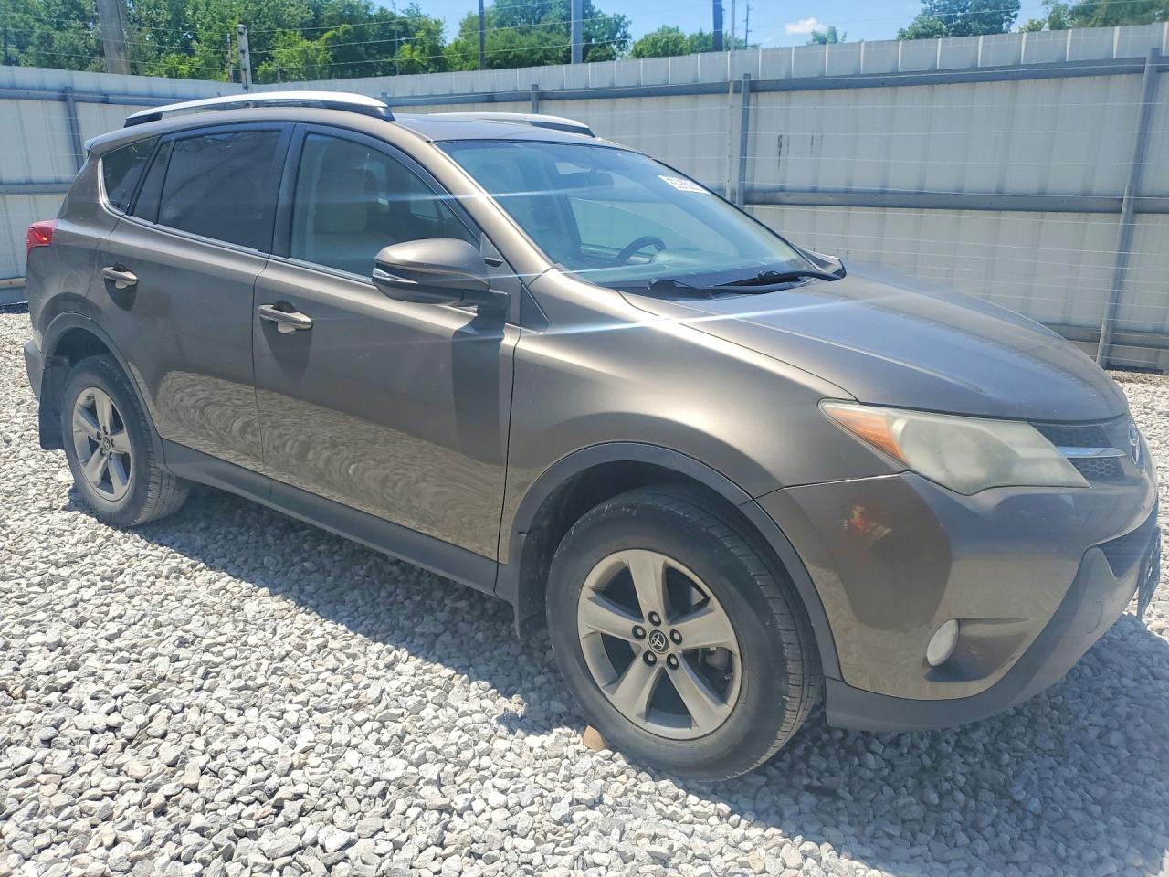 2015 Toyota RAV4 VIN 2T3RFREV2FW243229 COPART salvage auction — Minor Dent/Scratches, OH - CERT OF TITLE-REPOSSESSION, sold $5,800 on 2026-07-09 (photo 4)