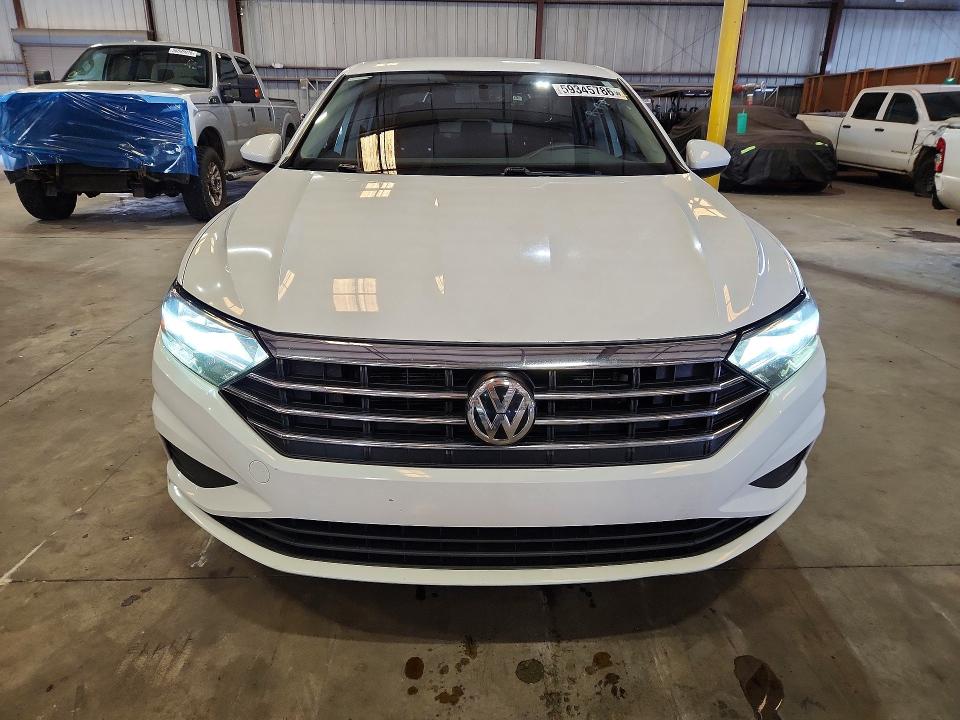 2019 Volkswagen Jetta VIN 3VWN57BU8KM059472 COPART salvage auction — MINOR DENT/SCRATCHES, Fl - Certificate Of Title, sold $2,750 on 2026-07-12 (photo 5)