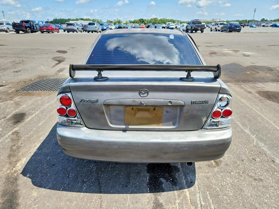 2002 Mazda Protege VIN JM1BJ225X21599996 COPART salvage auction — SIDE, FL - CERT OF TITLE SLVG REBUILDABLE, sold $250 on 2026-07-22 (photo 6)