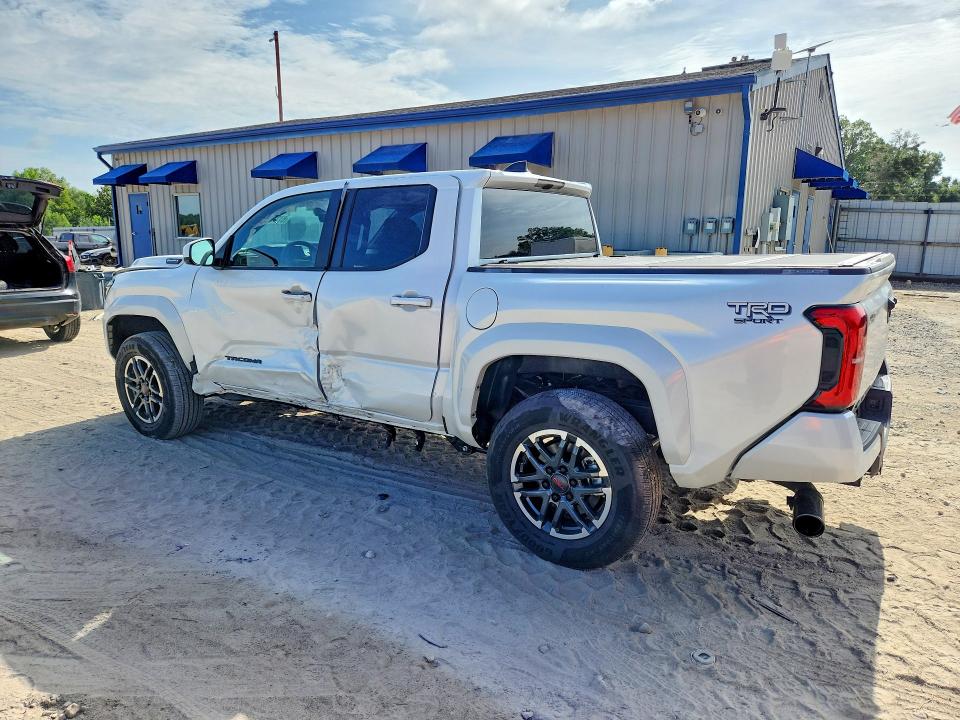 2026 Toyota Tacoma VIN 3TYLC5LN7TT057763 COPART salvage auction — SIDE, Fl - Cert Of Title Slvg Rebuildable, sold $16,700 on 2026-07-31 (photo 2)