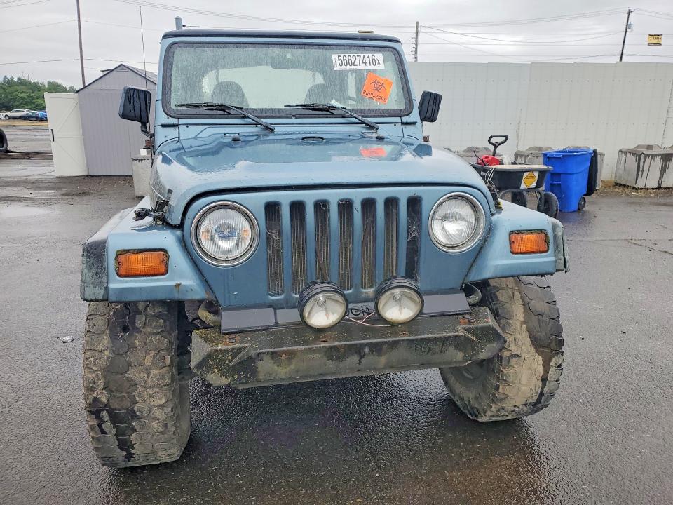 1998 Jeep Wrangler / VIN 1J4FY19S2WP739281 COPART salvage auction — SIDE, Or - Certificate Of Title, sold $2,200 on 2026-07-08 (photo 5)