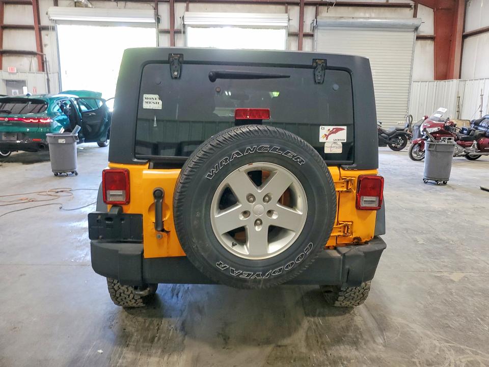 2013 Jeep Wrangler unlimited VIN 1C4BJWDG3DL557117 COPART salvage auction — NORMAL WEAR, VA - CERTIFICATE OF TITLE, sold $2,450 on 2026-09-02 (photo 6)