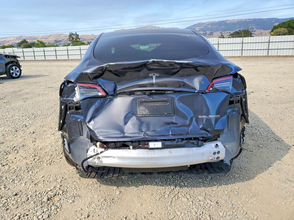 2024 Tesla Model y VIN 7SAYGDEF1RF079621 COPART salvage auction — REAR END, Ca - Salvage Certificate, sold $12,800 on 2026-07-21 (photo 6)