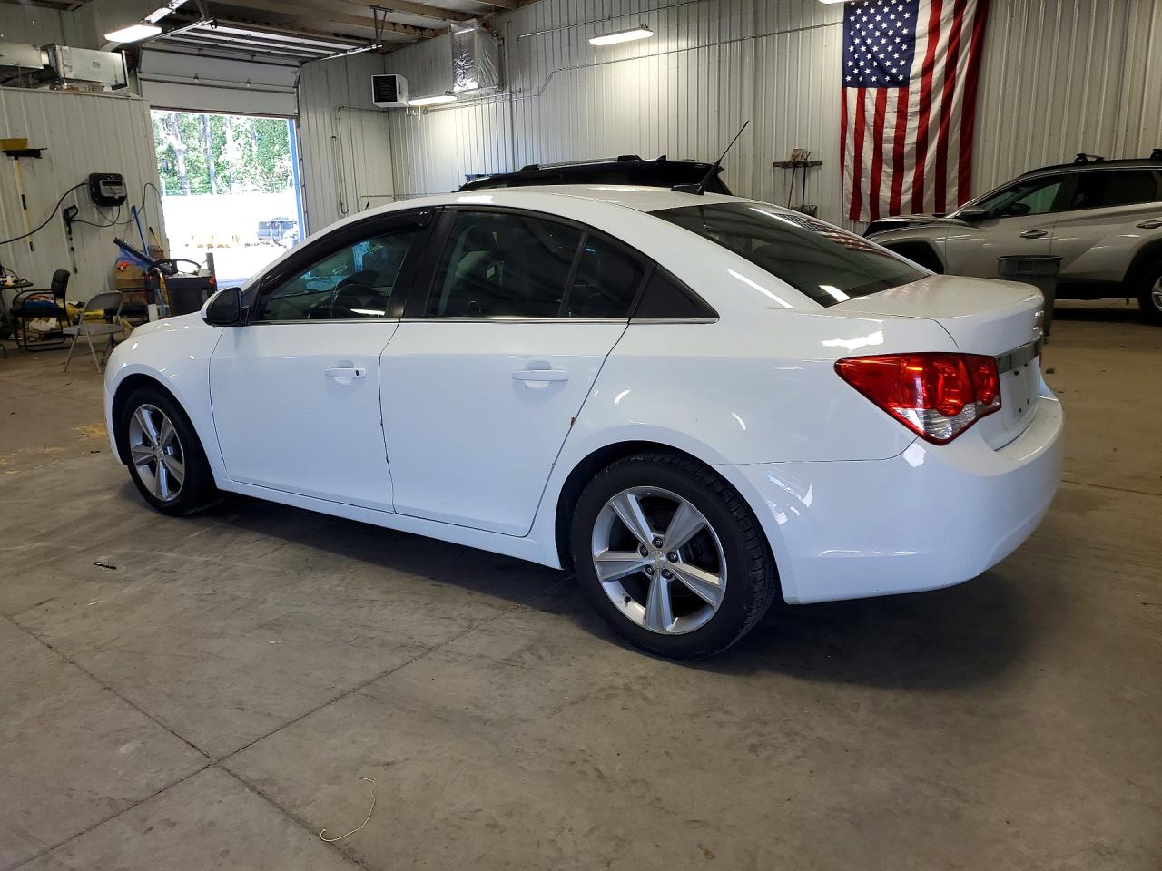 2013 Chevrolet Cruze VIN 1G1PE5SB7D7102297 COPART salvage auction — Hail, MN - CERT OF TITLE-SALVAGE, sold $750 on 2026-07-09 (photo 2)