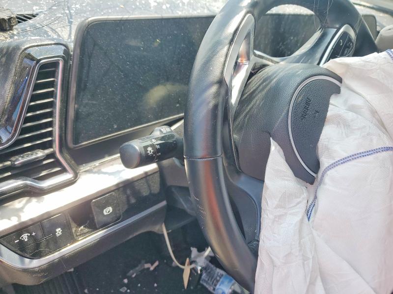 2023 Kia Sportage VIN 5XYK33AF8PG123683 COPART salvage auction — ALL OVER, IA - CERT OF TITLE-SALVAGE TITLE, sold $3,200 on 2026-07-24 (photo 9)