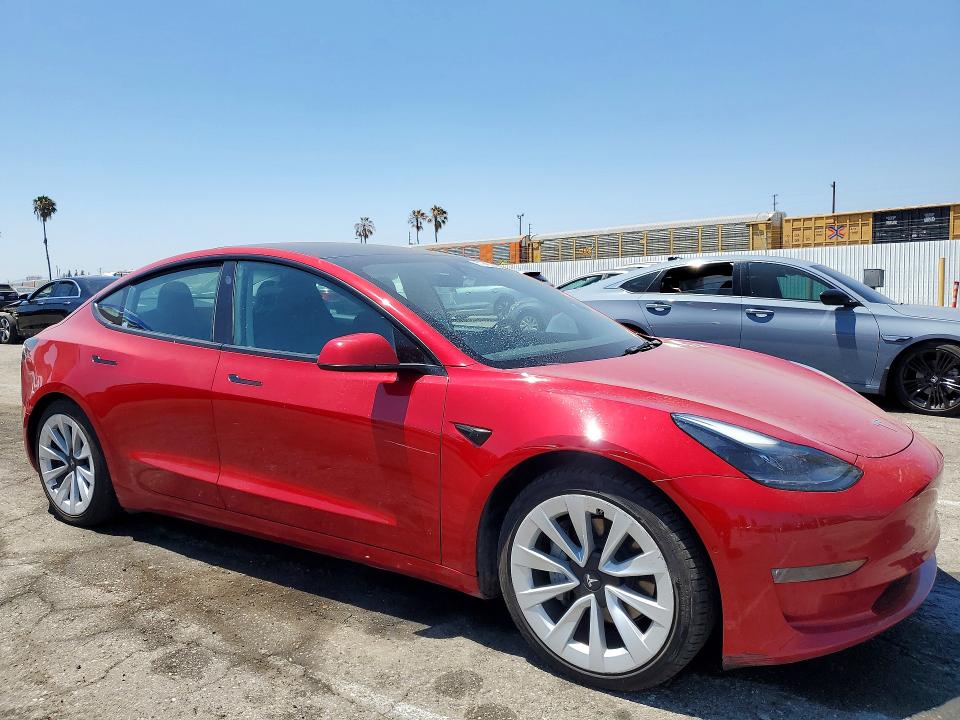 2022 Tesla Model 3 VIN 5YJ3E1EB8NF271878 COPART salvage auction — SIDE, Ca - Salvage Certificate, sold $7,900 on 2026-07-28 (photo 4)