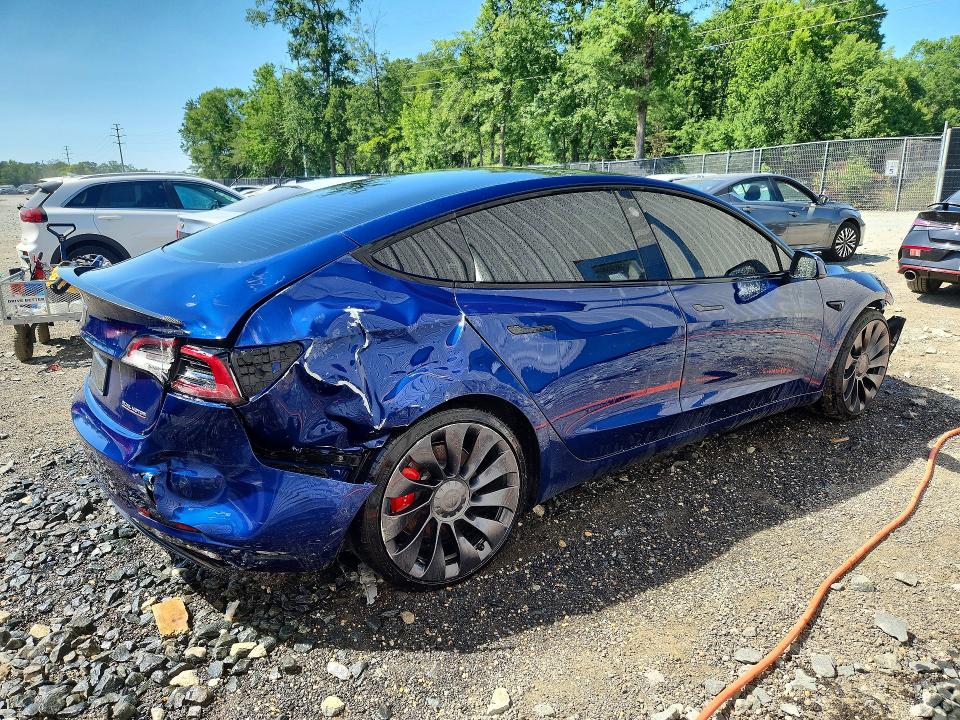 2022 Tesla Model 3 VIN 5YJ3E1EC6NF321735 COPART salvage auction — FRONT END, WV - CERTIFICATE OF TITLE, sold $12,900 on 2026-07-14 (photo 3)
