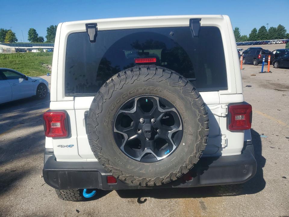 2022 Jeep Wrangler unlimited VIN 1C4JJXR64NW211580 COPART salvage auction — MINOR DENT/SCRATCHES, Mo - Certificate Of Title, sold $17,000 on 2026-07-16 (photo 6)