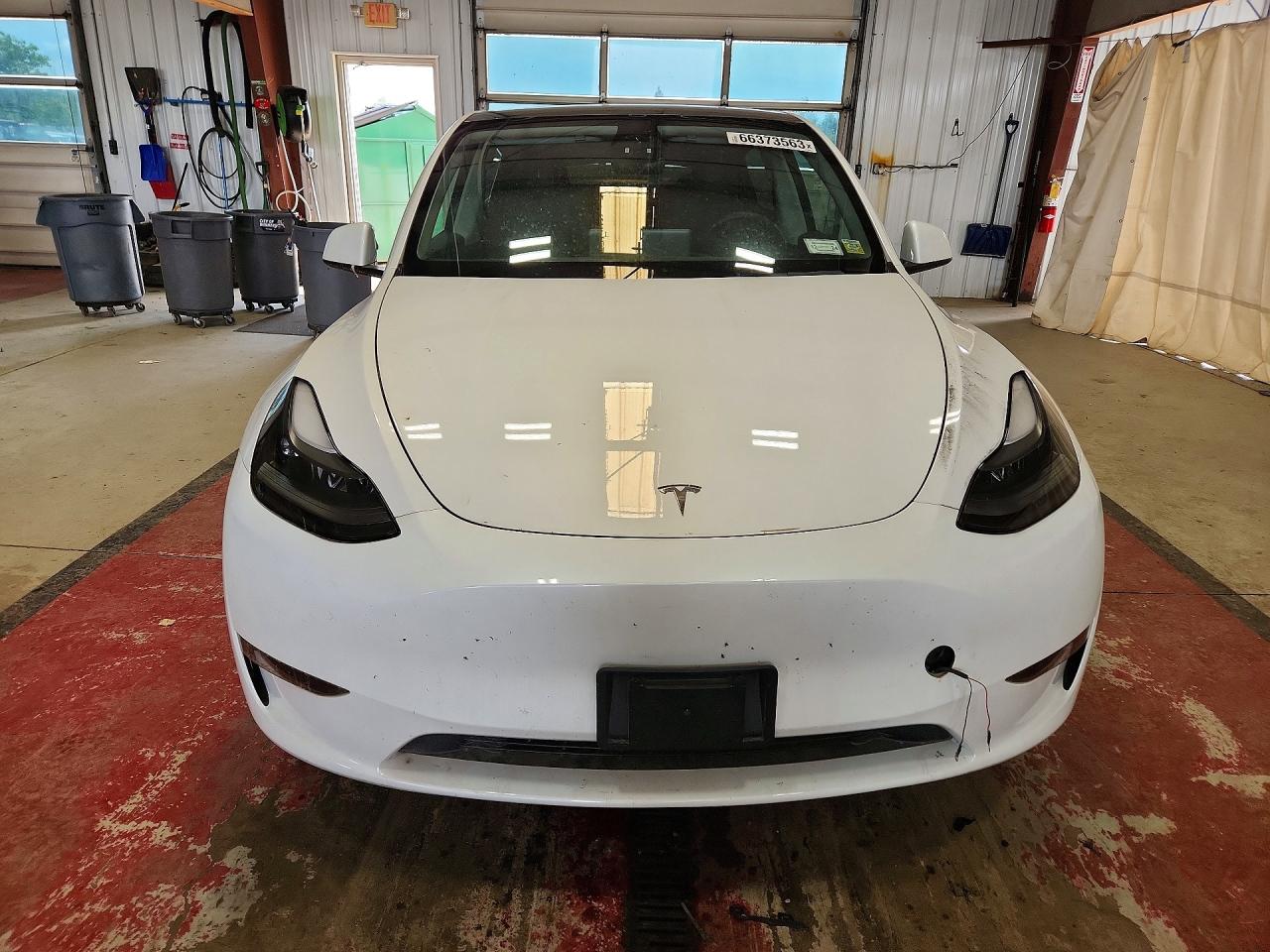 2023 Tesla Model Y VIN 7SAYGDEE7PF606971 COPART salvage auction — Rear End, NY - MV-907A SALVAGE CERTIFICATE, sold $8,900 on 2026-07-06 (photo 5)