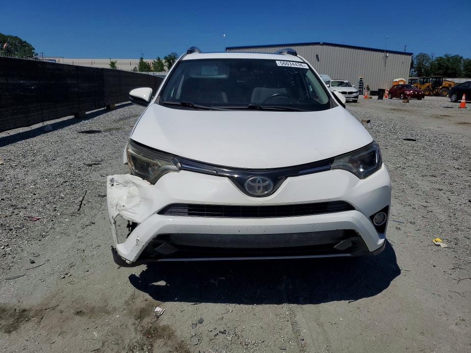 2017 Toyota Rav 4 VIN JTMWFREV9HD096782 COPART salvage auction — SIDE, Nc - Salvage Certificate Of Title, sold $4,950 on 2026-07-22 (photo 5)