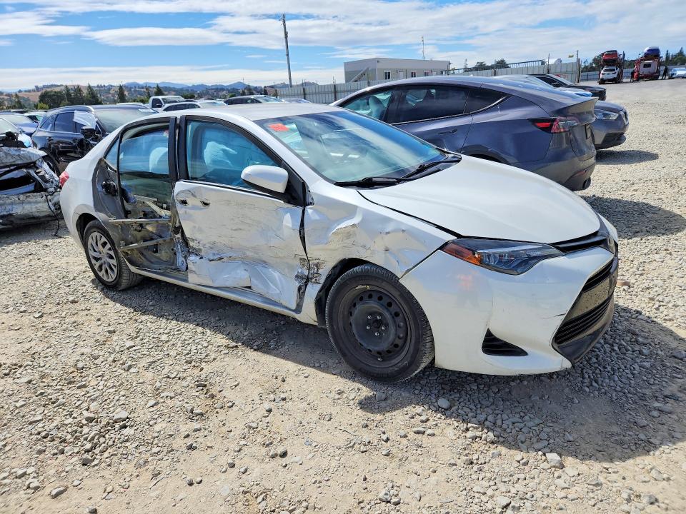 2019 Toyota Corolla VIN 5YFBURHE5KP941857 COPART salvage auction — SIDE, Ca - Salvage Certificate, sold $2,900 on 2026-07-14 (photo 4)