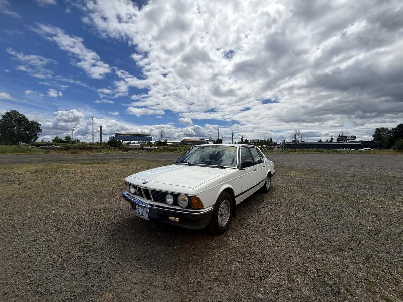 1985 BMW 7 series VIN WBAFJ910608751757 COPART salvage auction — MINOR DENT/SCRATCHES, Or - Certificate Of Title (P), sold $5,800 on 2026-07-13 (photo 2)