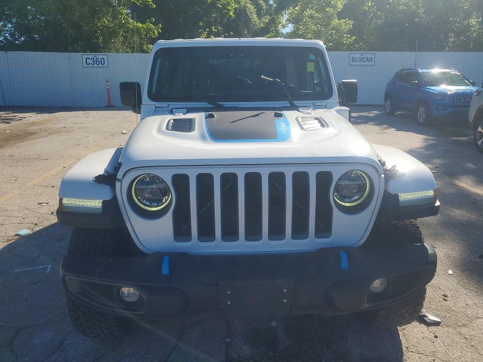 2022 Jeep Wrangler unlimited VIN 1C4JJXR64NW211580 COPART salvage auction — MINOR DENT/SCRATCHES, Mo - Certificate Of Title, sold $17,000 on 2026-07-16 (photo 5)