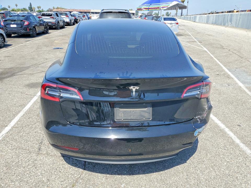 2020 Tesla Model 3 VIN 5YJ3E1EA7LF630142 COPART salvage auction — SIDE, Ca - Salvage Certificate, sold $3,400 on 2026-07-10 (photo 6)