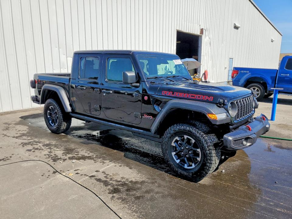 2026 Jeep Gladiator VIN 1C6RJTBG7TL155784 COPART salvage auction — MECHANICAL, Fl - Cert Of Title-Slvg Rebld Flood, sold $15,000 on 2026-07-27 (photo 4)