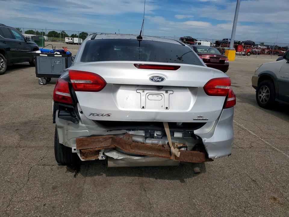 2016 Ford Focus VIN 1FADP3F21GL359363 COPART salvage auction — REAR END, OH - CERT OF TITLE-SALVAGE, sold $900 on 2026-07-02 (photo 6)