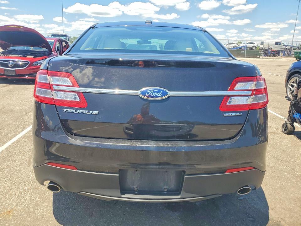 2014 Ford Taurus VIN 1FAHP2D80EG170020 COPART salvage auction — MINOR DENT/SCRATCHES, Oh - Certificate Of Title, sold $200 on 2026-07-04 (photo 6)