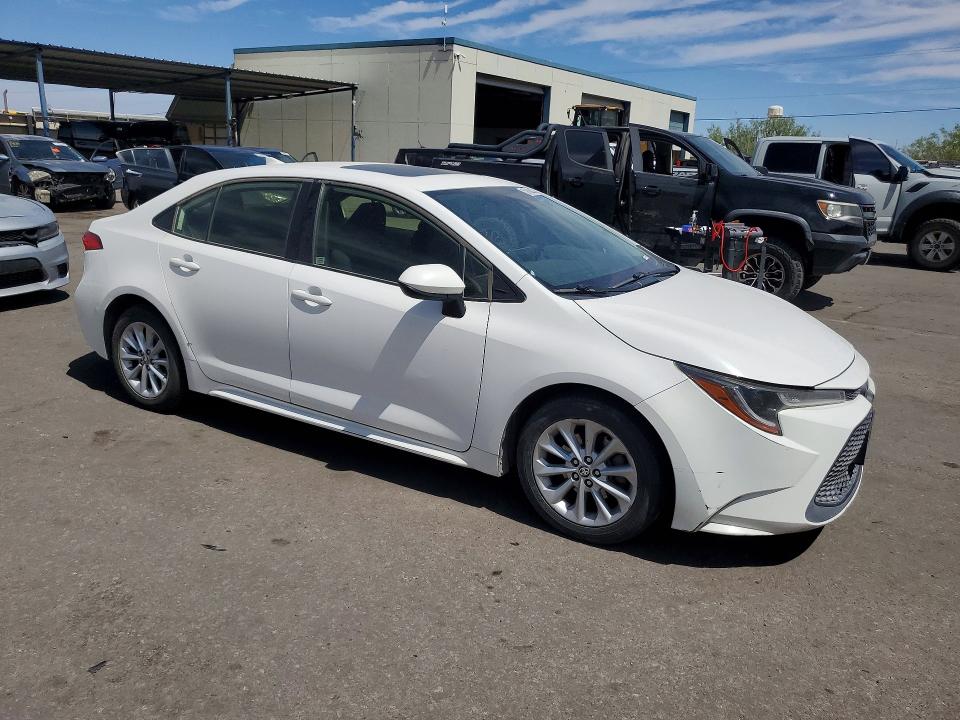 2021 Toyota Corolla VIN JTDHPMAE7MJ162935 COPART salvage auction — MINOR DENT/SCRATCHES, Tx - Certificate Of Title, sold $4,050 on 2026-07-17 (photo 4)