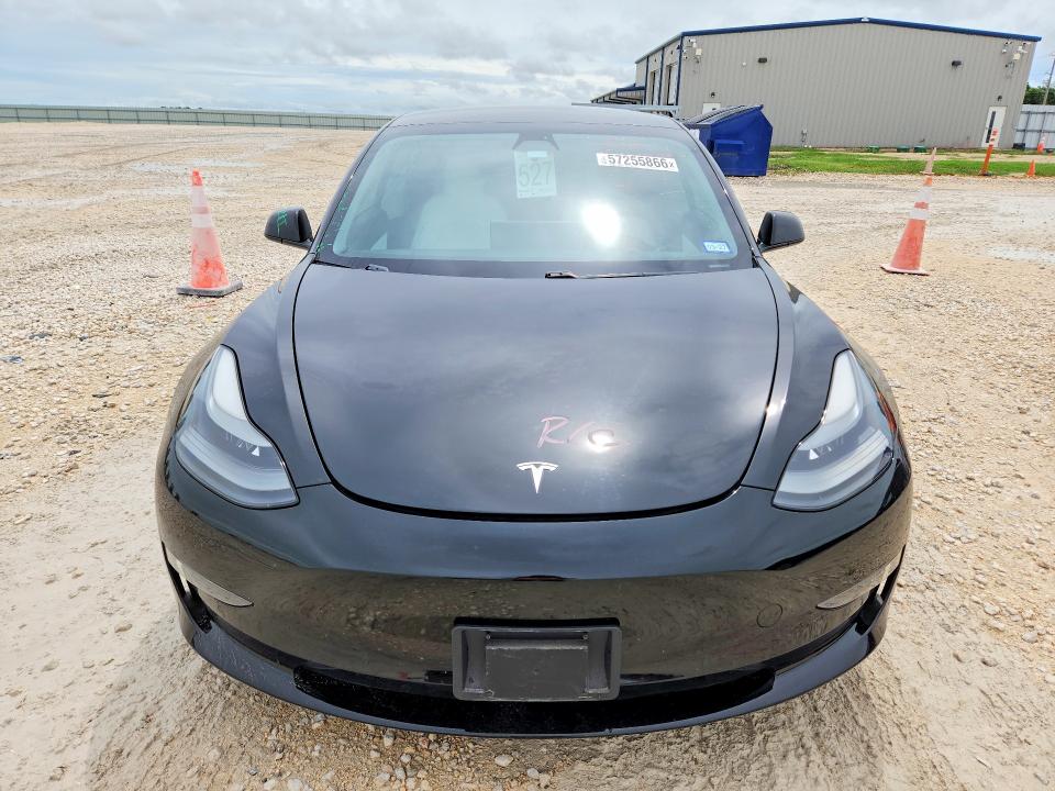 2021 Tesla VIN 5YJ3E1EA6MF921619 COPART salvage auction — SIDE, TX - SALVAGE VEHICLE TITLE (P), sold $5,700 on 2026-07-23 (photo 5)