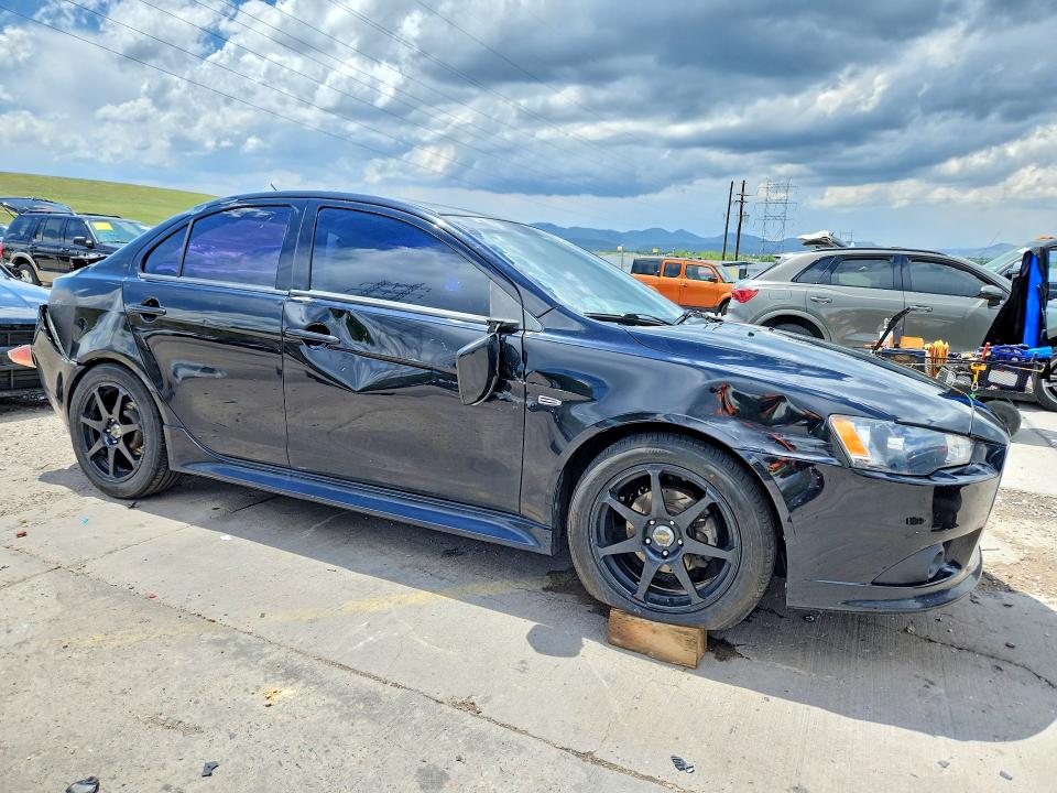 2015 Mitsubishi VIN JA32V2FW2FU021174 COPART salvage auction — REAR END, CO - PUBLIC - SALVAGE TITLE, sold $825 on 2026-07-27 (photo 4)