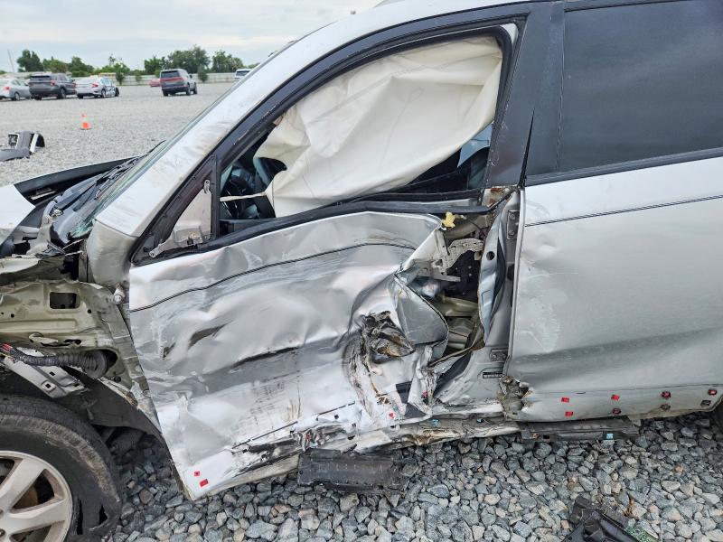 2012 Kia Sorento VIN 5XYKT3A61CG255307 COPART salvage auction — SIDE, Fl - Cert Of Title Slvg Rebuildable, sold $475 on 2026-07-07 (photo 7)