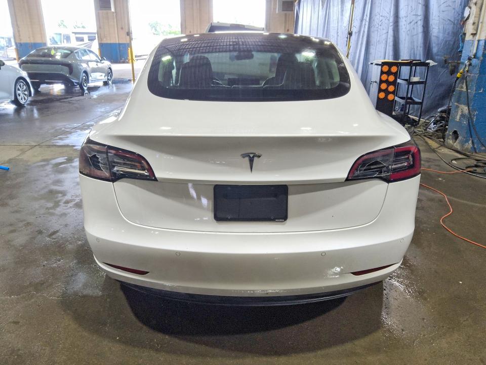 2020 Tesla Model 3 VIN 5YJ3E1EAXLF644830 COPART salvage auction — MINOR DENT/SCRATCHES, CA - CERTIFICATE OF TITLE, sold $4,550 on 2026-07-28 (photo 6)