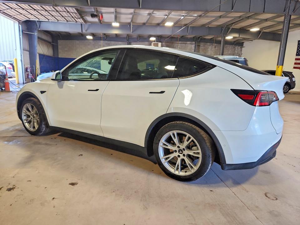 2021 Tesla Model y VIN 5YJYGDED2MF109150 COPART salvage auction — NORMAL WEAR, Wv - Certificate Of Title, sold $18,000 on 2026-07-23 (photo 2)