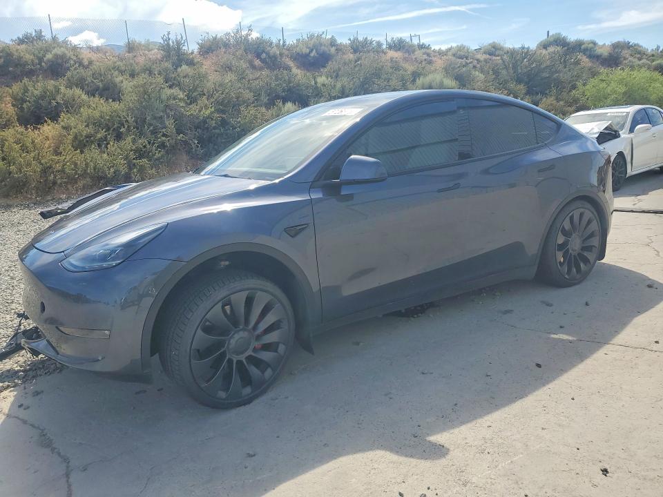 2023 Tesla Model y VIN 7SAYGDEF9PF711908 COPART salvage auction — SIDE, Nv - Salvage Title, sold $10,700 on 2026-07-06 (photo 1)