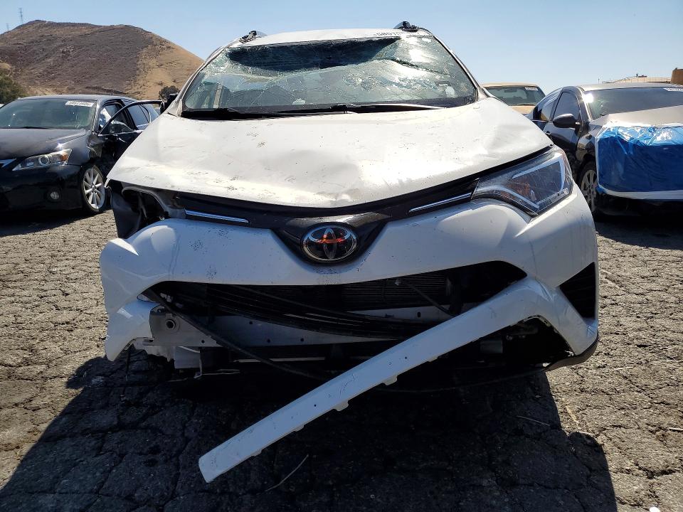 2018 Toyota VIN JTMZFREV4JJ747806 COPART salvage auction — ROLLOVER, Ca - Salvage Certificate, sold $3,650 on 2026-07-16 (photo 5)