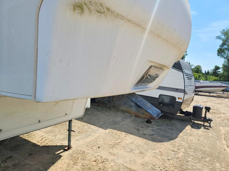 2008 Keystone Camper VIN 4YDF3402684701444 COPART salvage auction — WATER/FLOOD, FL - CERT OF TITLE-SLVG REBLD FLOOD, sold $925 on 2026-09-11 (photo 7)