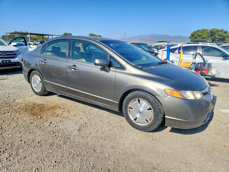 2006 Honda Civic hybrid VIN JHMFA36266S004020 COPART salvage auction — MINOR DENT/SCRATCHES, Ca - Dis/Dlr/Exp Only Clean Title, sold $425 on 2026-07-28 (photo 4)