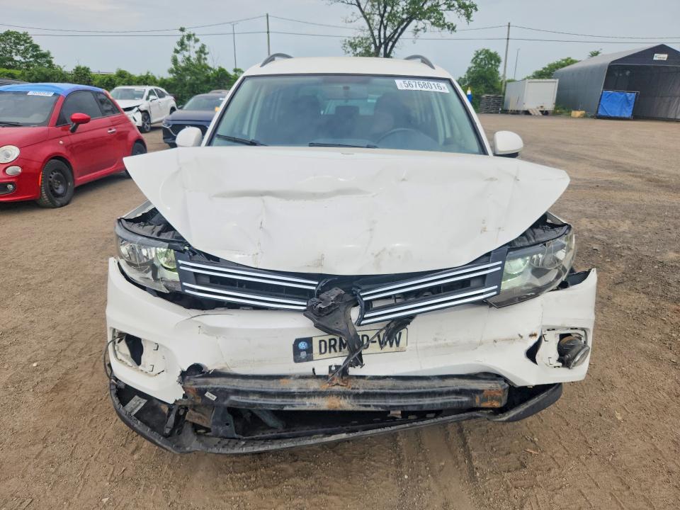 2014 Volkswagen Tiguan VIN WVGHV3AX0EW546122 COPART salvage auction — FRONT END, Qc - Gravement Accidente, sold $475 on 2026-07-14 (photo 5)