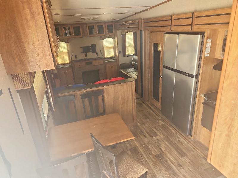 2017 Keystone Laredo VIN 4YDF34224HE601687 COPART salvage auction — HAIL, TX - CERTIFICATE OF TITLE, sold $17,800 on 2026-08-18 (photo 6)