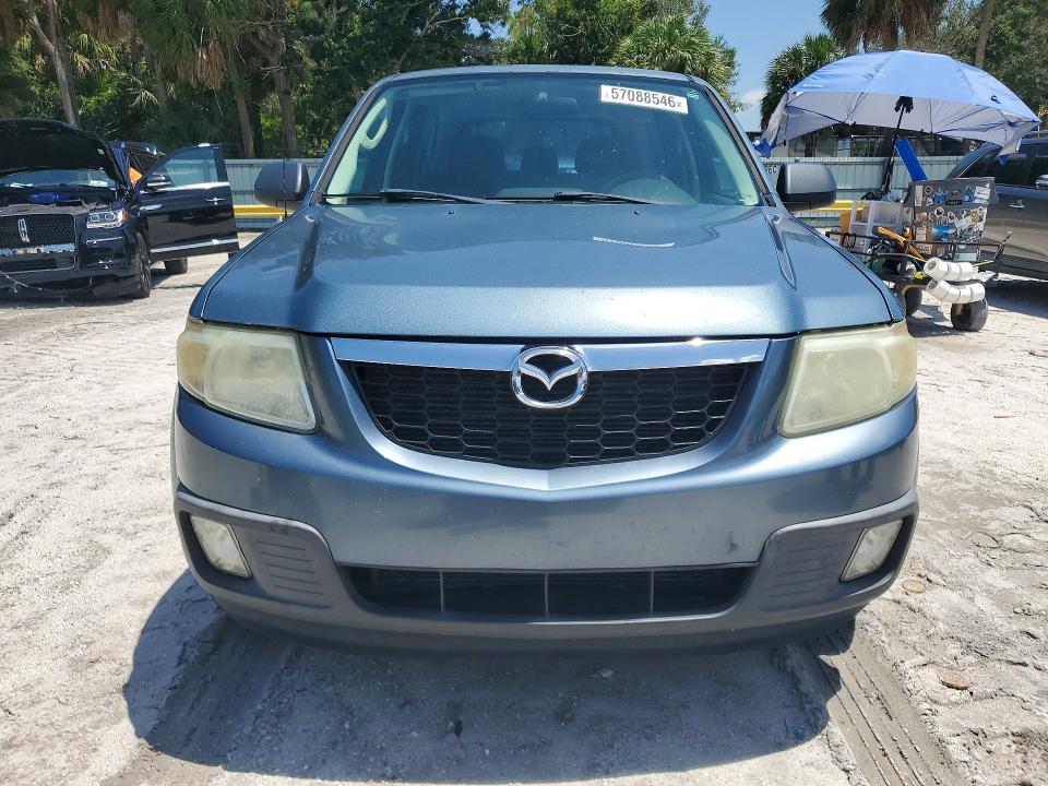 2011 Mazda Tribute VIN 4F2CY0C78BKM07294 COPART salvage auction — NORMAL WEAR, Fl - Certificate Of Title, sold $850 on 2026-07-08 (photo 5)