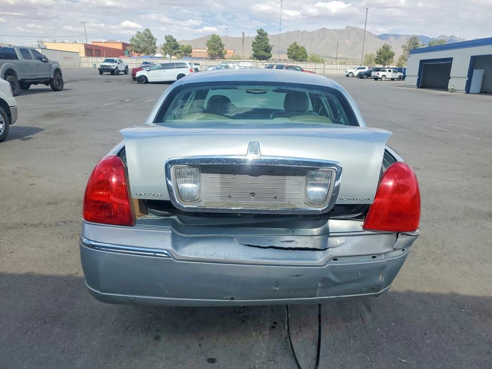 2007 Lincoln TOWN CAR VIN 1LNHM81W17Y617942 COPART salvage auction — REAR END, Nm - Certificate Of Title, sold $275 on 2026-07-10 (photo 6)