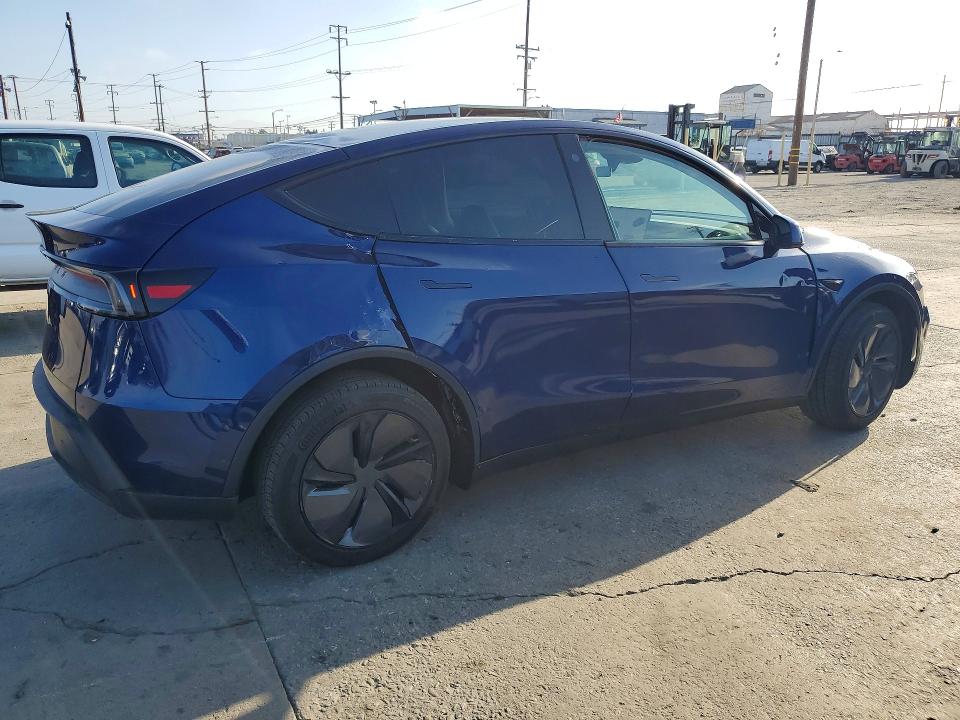 2026 Tesla Model y VIN 7SAYGDEDXTF407480 COPART salvage auction — SIDE, Ca - Salvage Certificate, sold $22,500 on 2026-07-09 (photo 3)