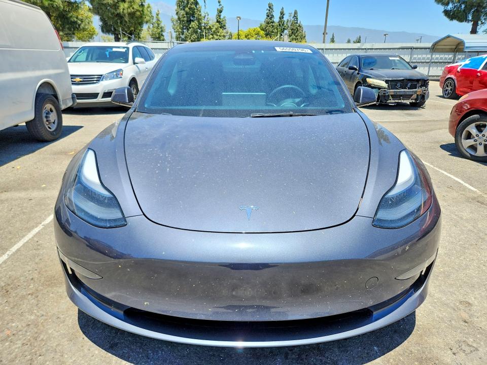 2023 Tesla Model 3 VIN 5YJ3E1EA8PF692056 COPART salvage auction — REAR END, Ca - Salvage Certificate, sold $7,700 on 2026-07-16 (photo 5)