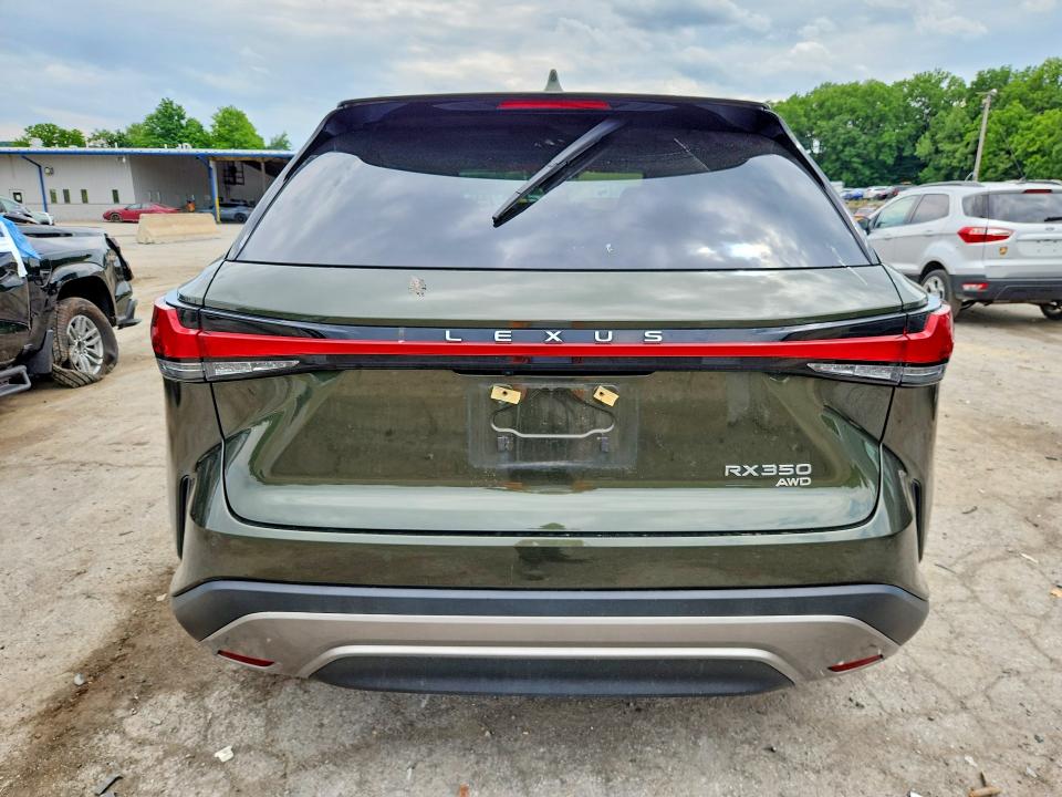 2023 Lexus Rx VIN 2T2BAMCA4PC030812 COPART salvage auction — FRONT END, NY - MV-907A SALVAGE CERTIFICATE, sold $18,000 on 2026-07-02 (photo 6)