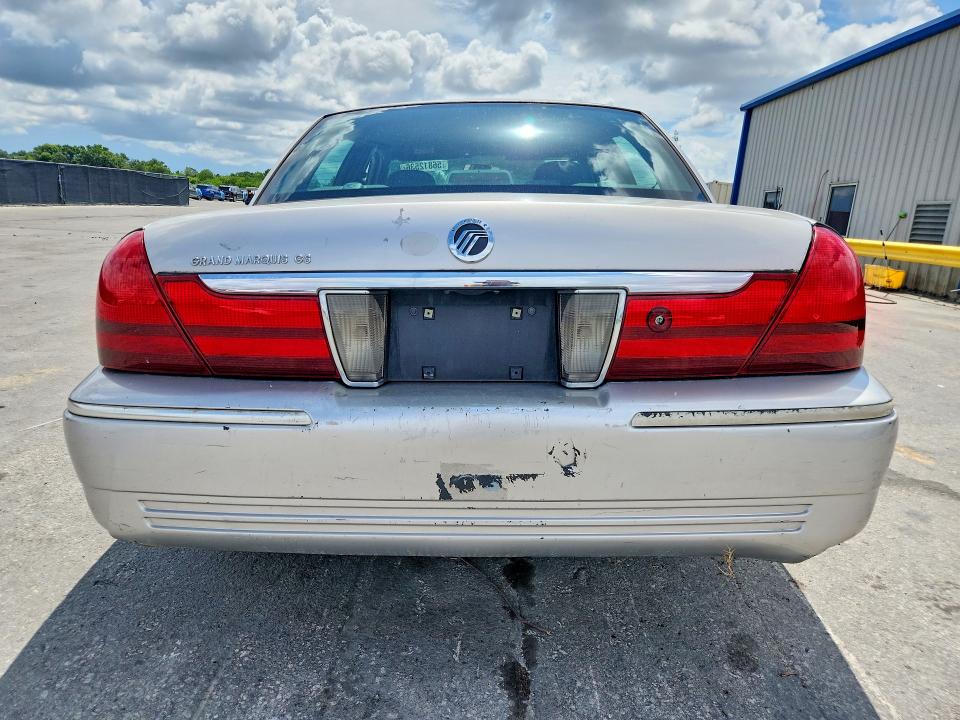 2004 Mercury Grand marquis VIN 2MEFM74W74X668924 COPART salvage auction — FRONT END, FL - CERT OF TITLE SLVG REBUILDABLE, sold $15 on 2026-07-21 (photo 6)