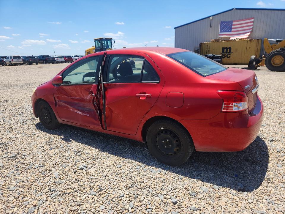 2011 Toyota Yaris VIN JTDBT4K30B1404802 COPART salvage auction — SIDE, Ks - Cert Of Title-Salvage, sold $750 on 2026-07-28 (photo 2)