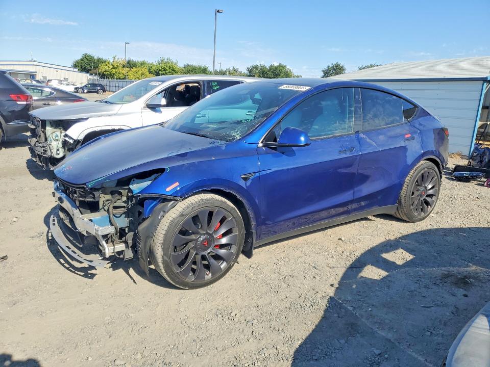 2022 Tesla Model y VIN 7SAYGDEF8NF565563 COPART salvage auction — FRONT END, Ca - Salvage Certificate, sold $10,600 on 2026-07-23 (photo 1)