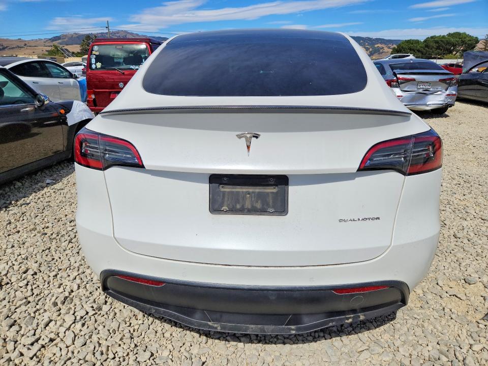 2022 Tesla Model y VIN 7SAYGDEF9NF411282 COPART salvage auction — UNDERCARRIAGE, Salvage Title, sold $11,300 on 2026-07-16 (photo 6)