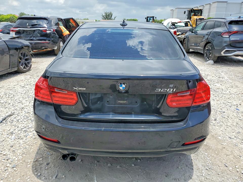 2013 BMW 3 series VIN WBA3B5C59DJ599182 COPART salvage auction — MINOR DENT/SCRATCHES, FL - CERT OF TITLE-FLOOD DAMAGED, sold $1,000 on 2026-07-17 (photo 6)