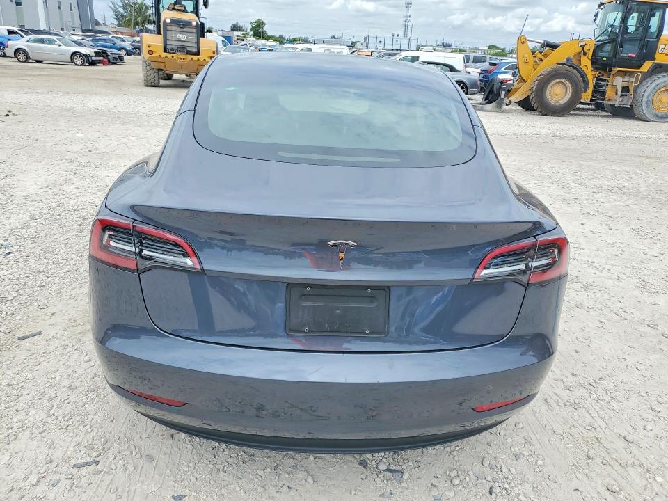 2023 Tesla Model 3 VIN 5YJ3E1EA6PF671061 COPART salvage auction — FRONT END, Fl - Cert Of Title Slvg Rebuildable, sold $10,200 on 2026-07-07 (photo 6)