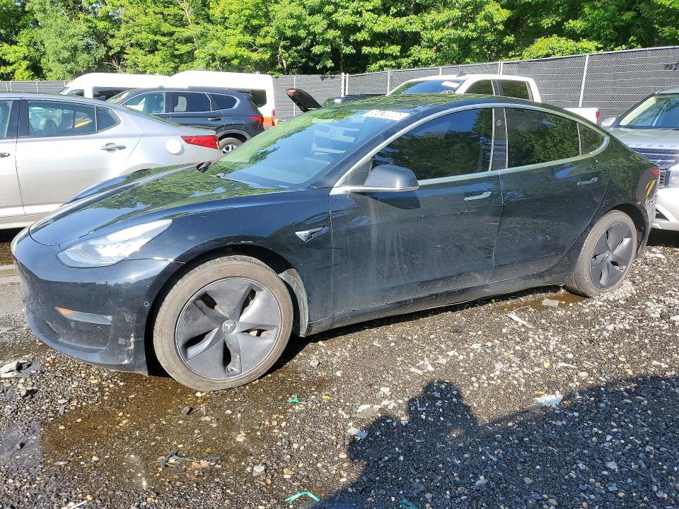 2018 Tesla Model 3 VIN 5YJ3E1EA8JF152035 COPART salvage auction — MINOR DENT/SCRATCHES, WV - CERTIFICATE OF TITLE, sold $8,600 on 2026-07-07 (photo 1)