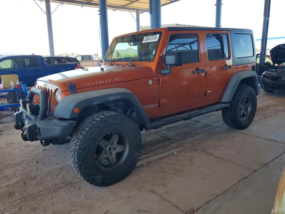 2011 Jeep Wrangler / VIN 1J4BA6H10BL505795 — COPART salvage auction photo