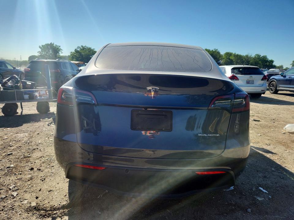 2023 Tesla Model y VIN 7SAYGDEE9PA034654 COPART salvage auction — SIDE, MD - CERT OF SALVAGE < 75% DAMAGE, sold $11,600 on 2026-07-07 (photo 6)